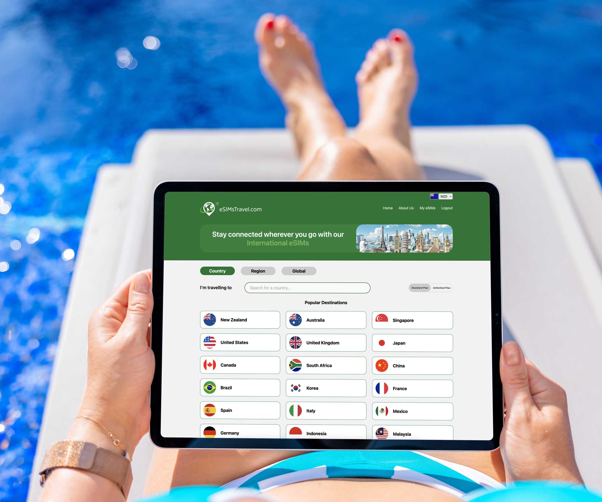 woman using tablet while floating in a swimming pool